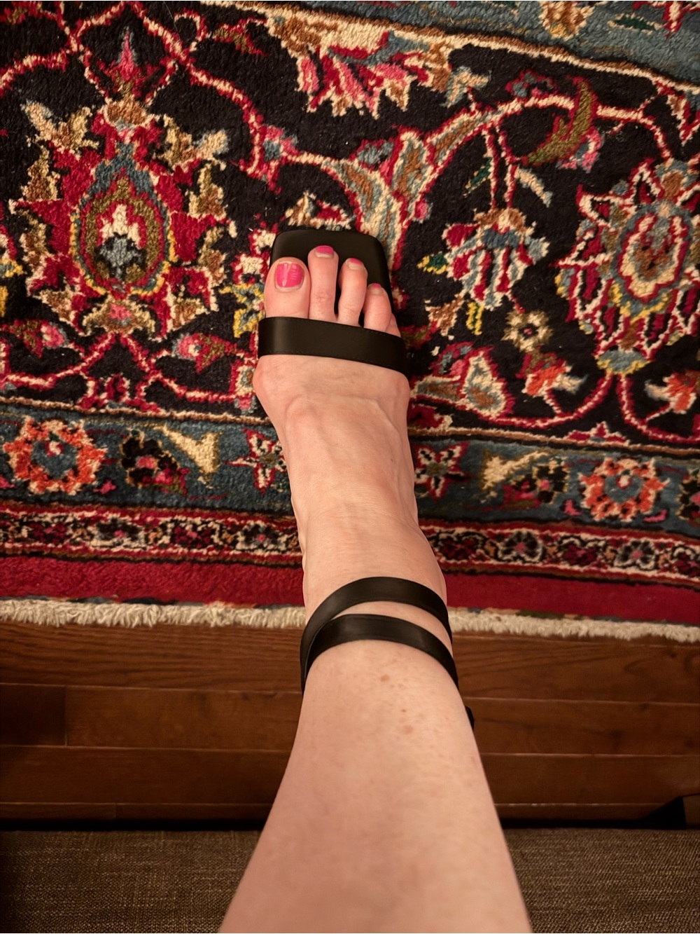 Black square heel satin sandal with ankle strap and heart charm